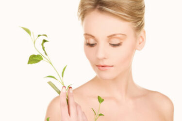 woman with sprout picture of woman with sprout over white